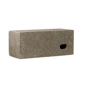 Grey wood concrete built-in Pino swift box with a small oval entrance hole on the bottom right hand side of the block.