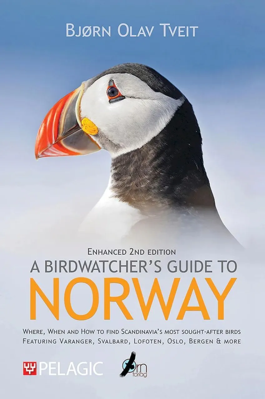 A Birdwatcher's Guide to Norway book cover showing a photograph of a puffin on a blue background.