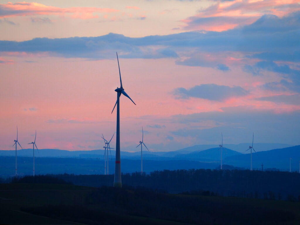 Wind turbines at sunset