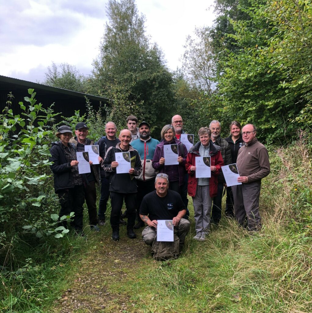 Gwent Wildlife Trust members holding certificates following training